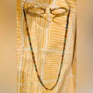 Eyeglass Holder:  Brown and Blue Beaded Necklace with Intricate Design